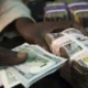 Naira appreciates massively against dollar across official, black markets